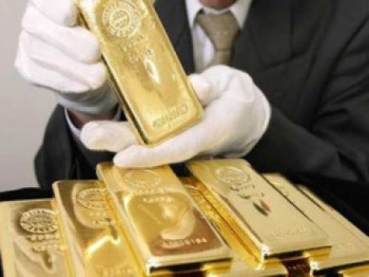 Preţul aurului, în cădere liberă, cu cel mai prost început de an din ultimul sfert de secol